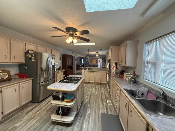 a view of wooden deck and city view