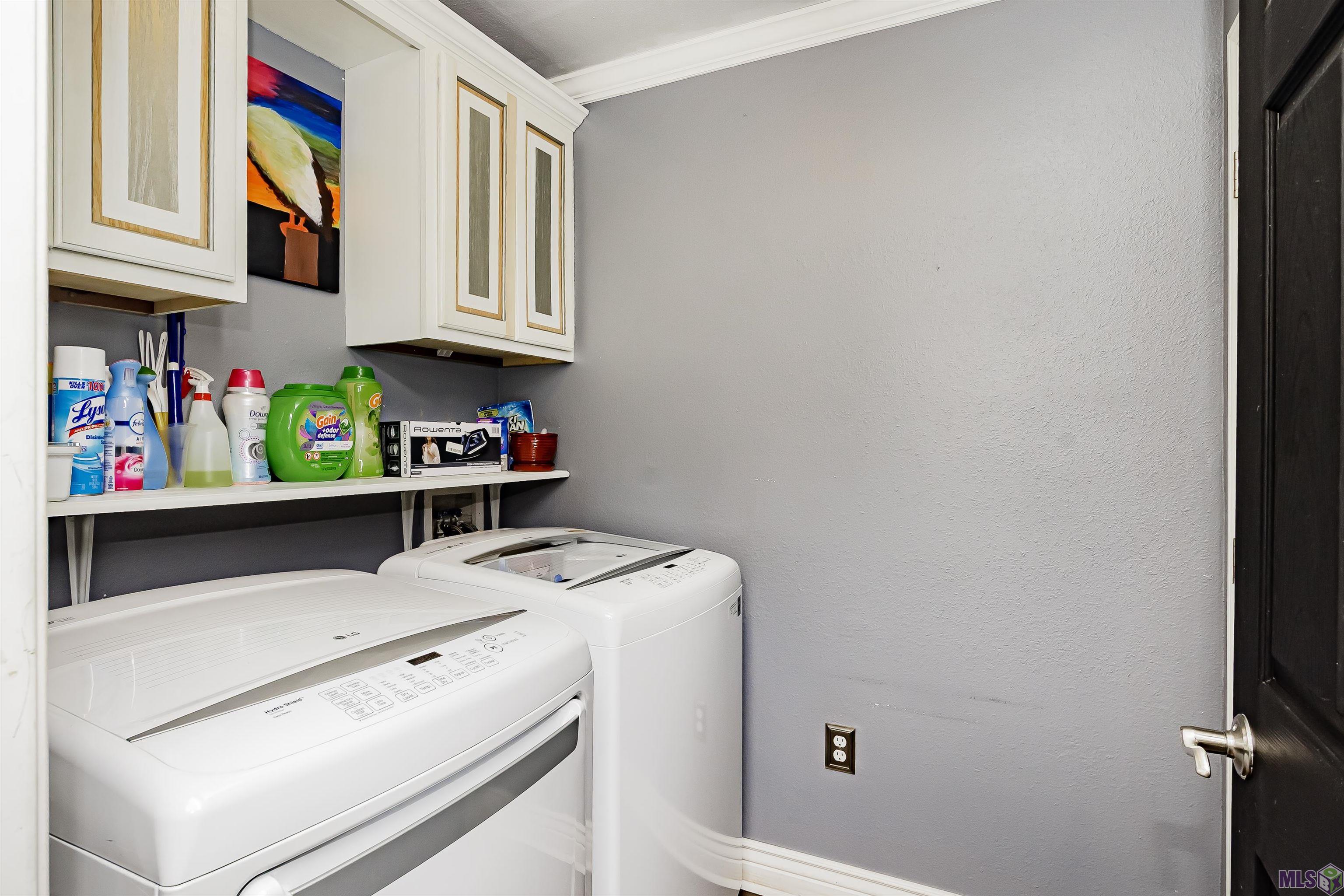 4301 Blueribbon Drive Baton Rouge, LA 70814 - Photo 18 of 21 Laundry room w/storage