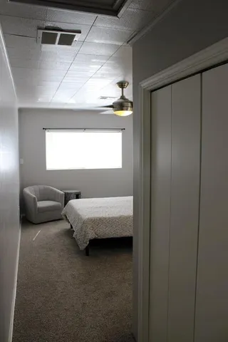 a bathroom with a tub and a window