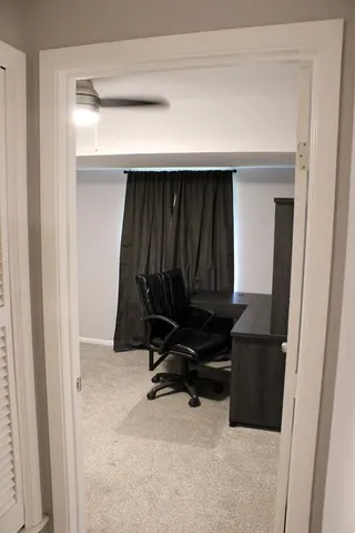 a room with furniture and a gate