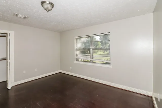 an empty room with a window