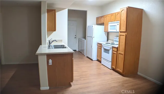 a hallway with cabinets