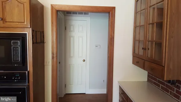 a view of front door with hallway