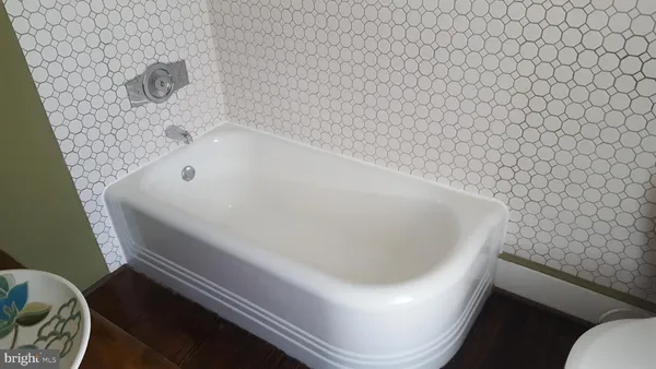 a bathroom with a bathtub