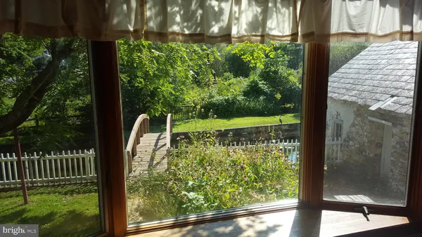 a view of a balcony with plants