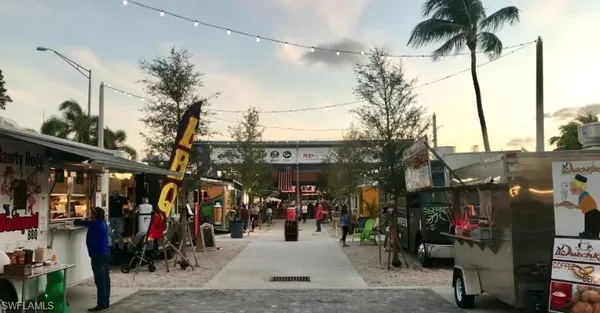 a view of street with sitting area