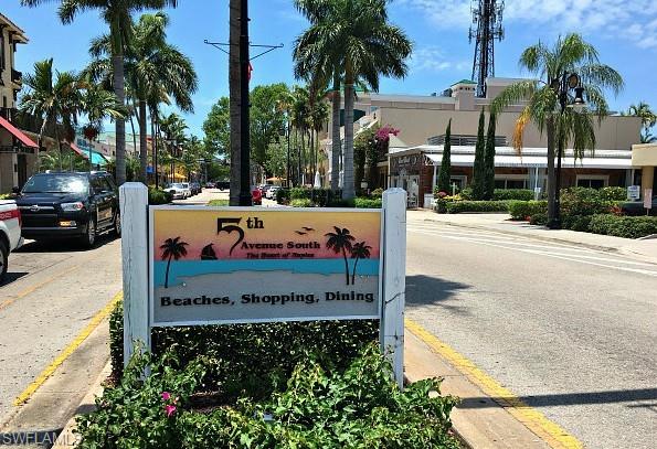 4430 Botanical Pl Circle, Unit 303 Naples, FL 34112 - Photo 3 of 22 a view of a park with palm trees