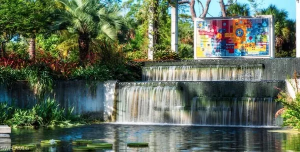 a view of swimming pool with a lake view