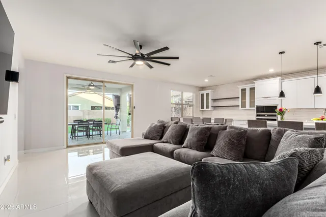 a view of a dining room with furniture and a fireplace
