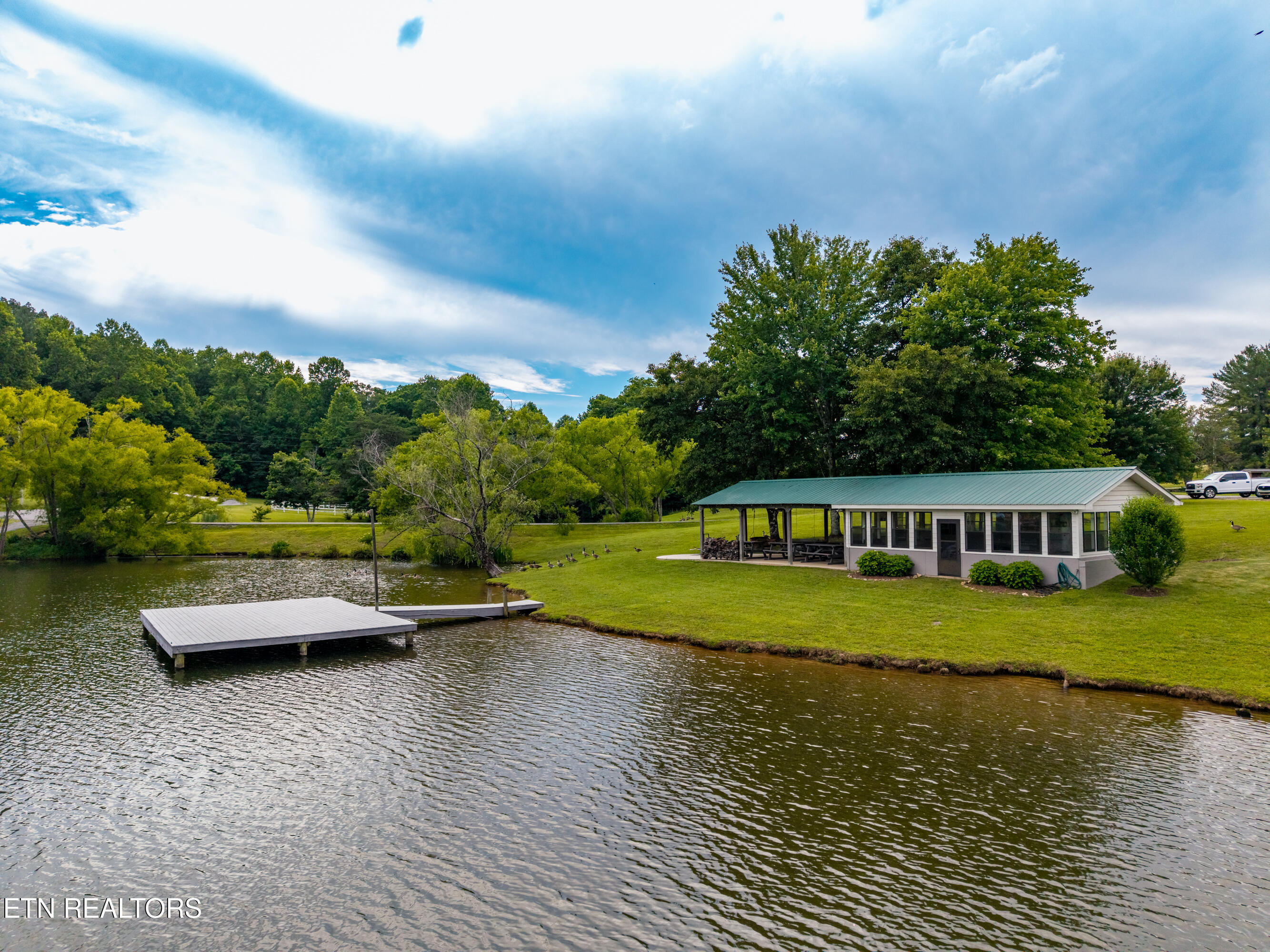 1152 Brier Branch Road Graysville, TN 37338 - Photo 45 of 49 Community Lake, dock, & clubhouse