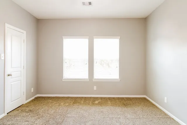 an empty room with a window