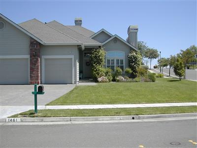 1461 Hawk Crest Place Santa Rosa, CA 95409 - Photo 2 of 9 a front view of a house with a yard