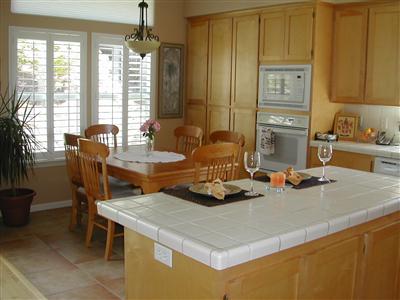 1461 Hawk Crest Place Santa Rosa, CA 95409 - Photo 4 of 9 a kitchen with a stove a sink and a refrigerator