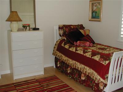 1461 Hawk Crest Place Santa Rosa, CA 95409 - Photo 8 of 9 a bed room with a bed