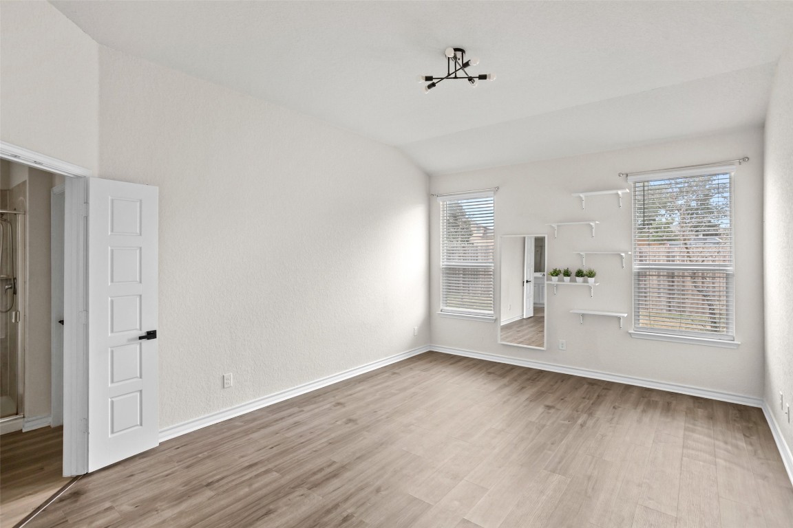 3409 Copper Acres Bulverde, TX 78163 - Photo 10 of 23 a view of empty room with wooden floor and fan