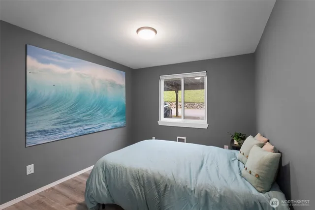 swimming pool view with a seating space