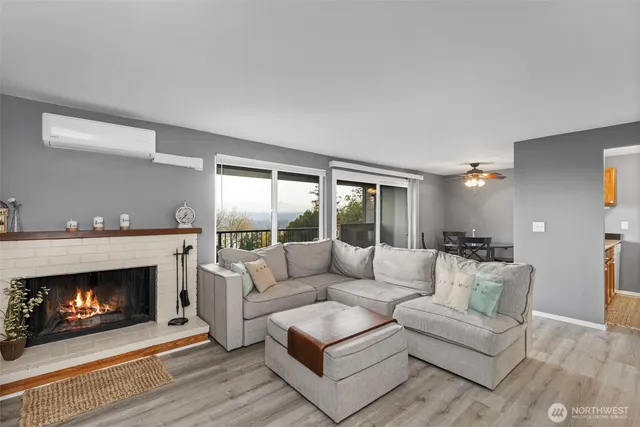 a balcony with furniture and a potted plant
