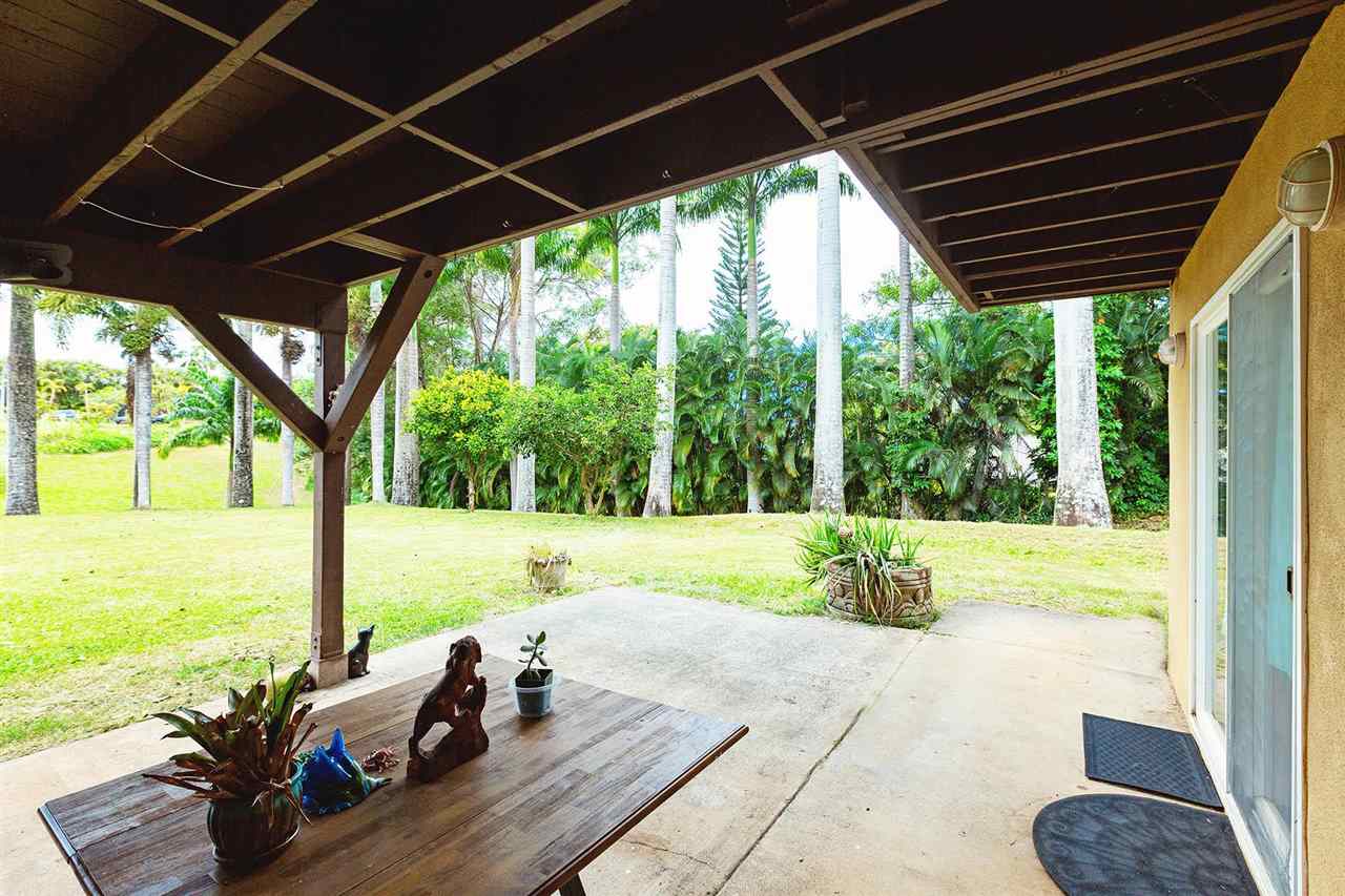 4509 Opana Place Haiku, HI 96708 - Photo 13 of 26 a view of a porch with furniture and backyard