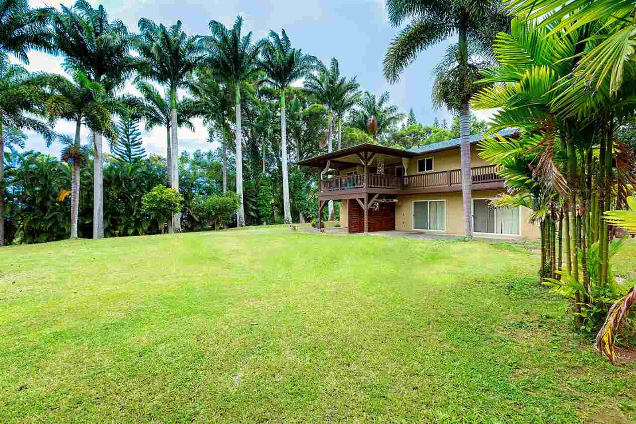 4509 Opana Place Haiku, HI 96708 - Photo 24 of 26 a view of a house with a yard