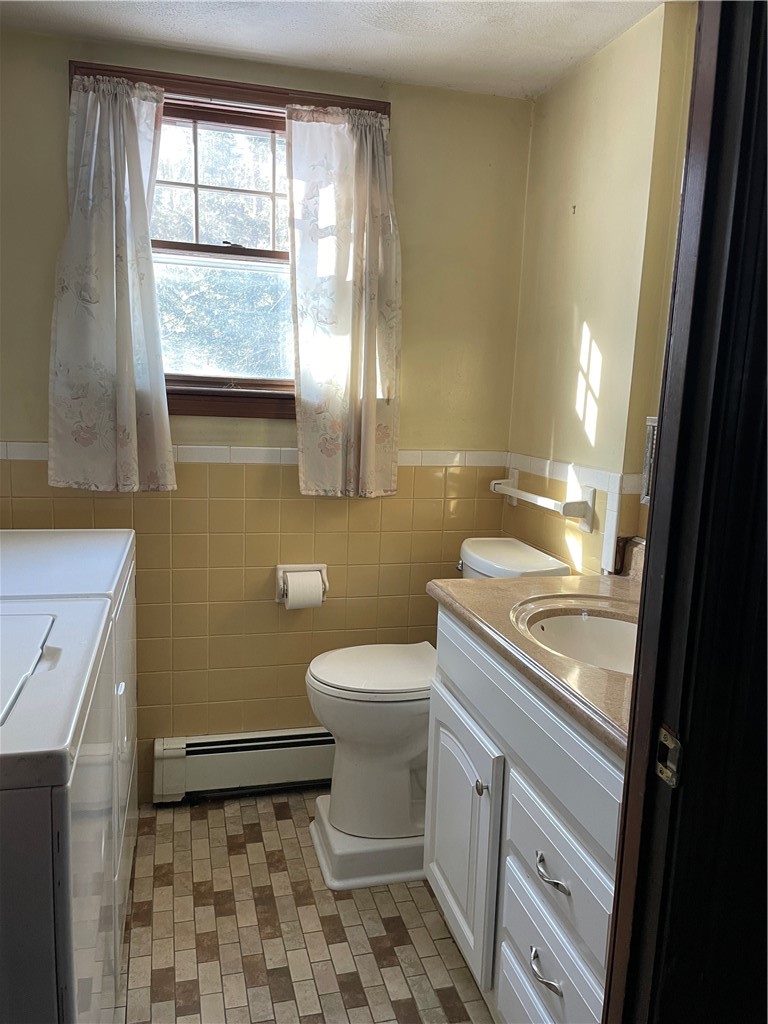 1 Grancera Drive Hopkinton, RI 02832 - Photo 11 of 38 first floor 1/2 bath with laundry