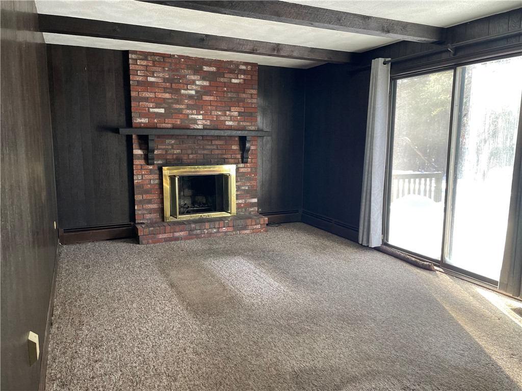 1 Grancera Drive Hopkinton, RI 02832 - Photo 5 of 38 family room with fireplace, slider to backyard