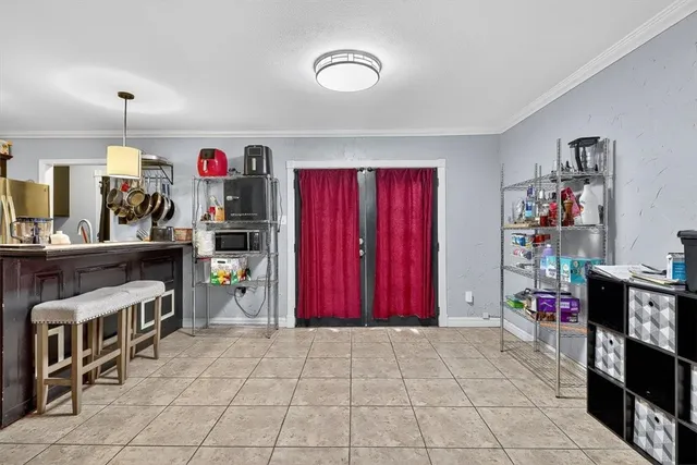 a view of room with guitars and closet