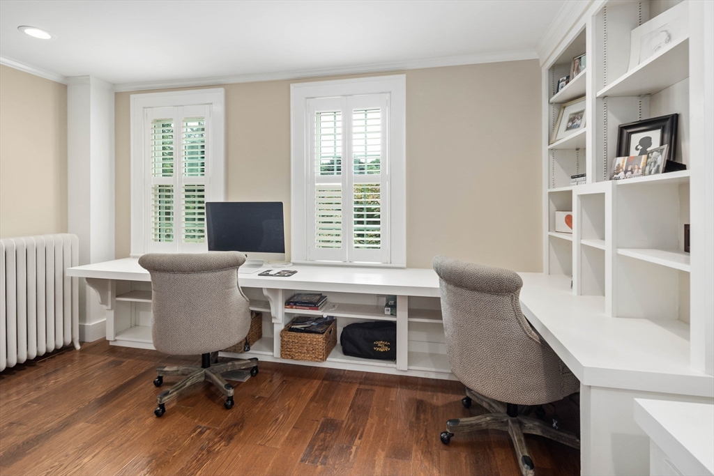17 Common Street Scituate, MA 02066 - Photo 11 of 39 a view of a workspace with furniture and a window