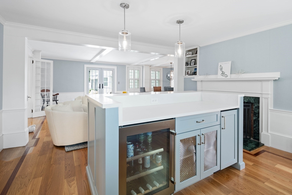 17 Common Street Scituate, MA 02066 - Photo 12 of 39 a kitchen with stainless steel appliances granite countertop a stove and a wooden floors