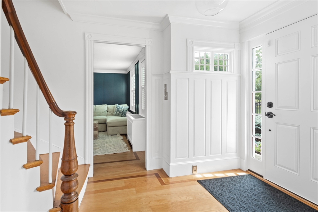 17 Common Street Scituate, MA 02066 - Photo 13 of 39 a view of a hallway with wooden floor and staircase