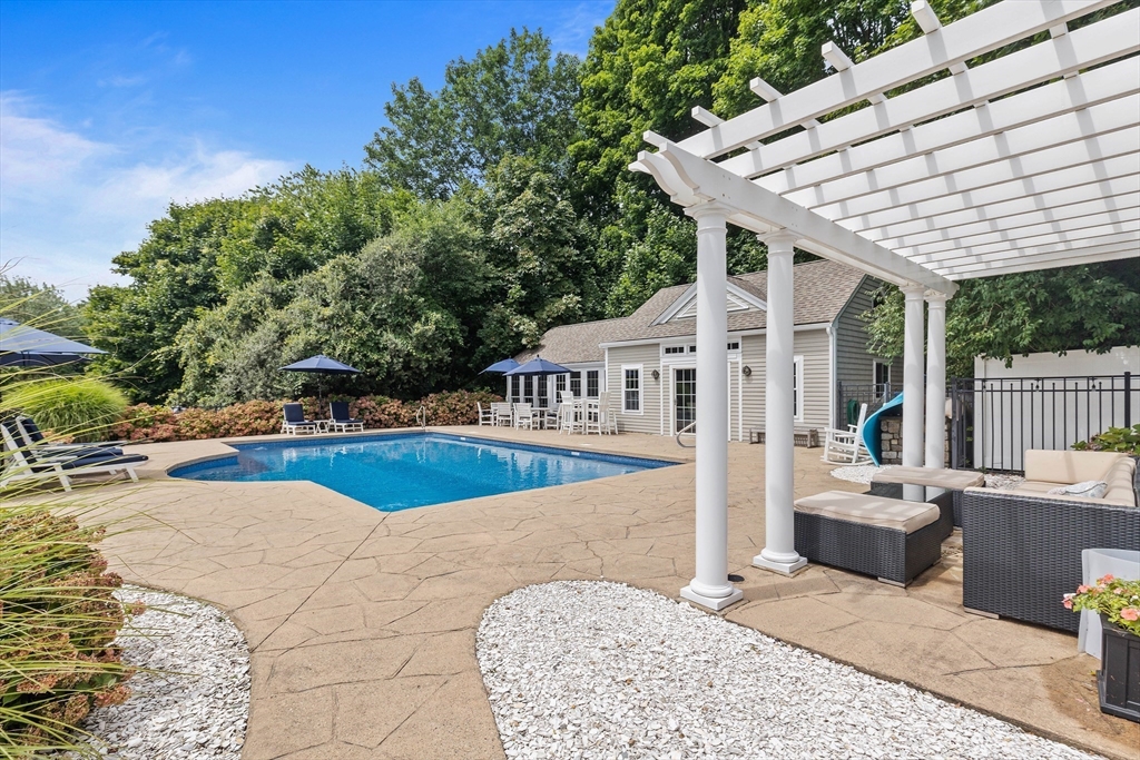 17 Common Street Scituate, MA 02066 - Photo 28 of 39 a view of a terrace with couches and wooden fence