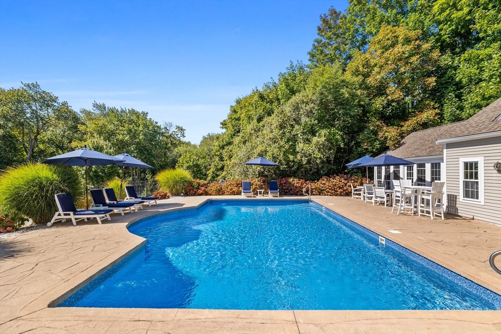 17 Common Street Scituate, MA 02066 - Photo 30 of 39 a view of a swimming pool with lounge chair