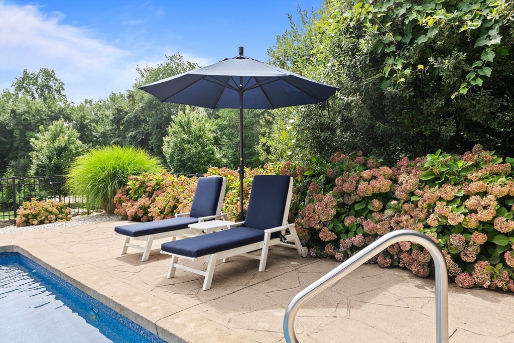 17 Common Street Scituate, MA 02066 - Photo 32 of 39 a view of a chairs and table in the patio