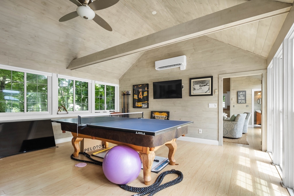 17 Common Street Scituate, MA 02066 - Photo 36 of 39 a room with furniture a window and a table