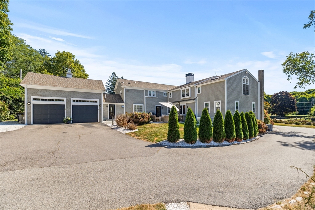 17 Common Street Scituate, MA 02066 - Photo 37 of 39 front view of a house with a yard