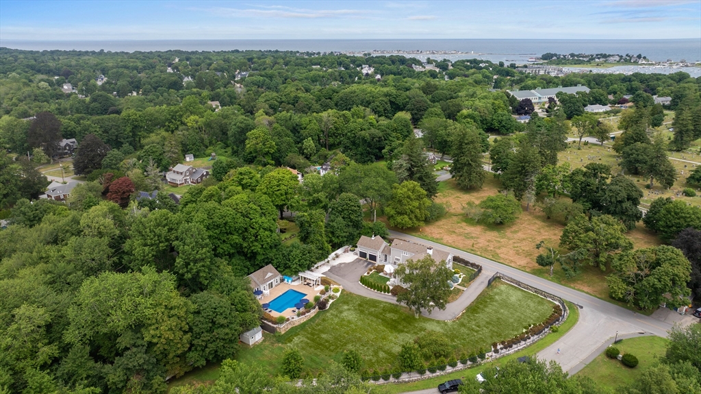 17 Common Street Scituate, MA 02066 - Photo 39 of 39 an aerial view of a house with a yard and lake