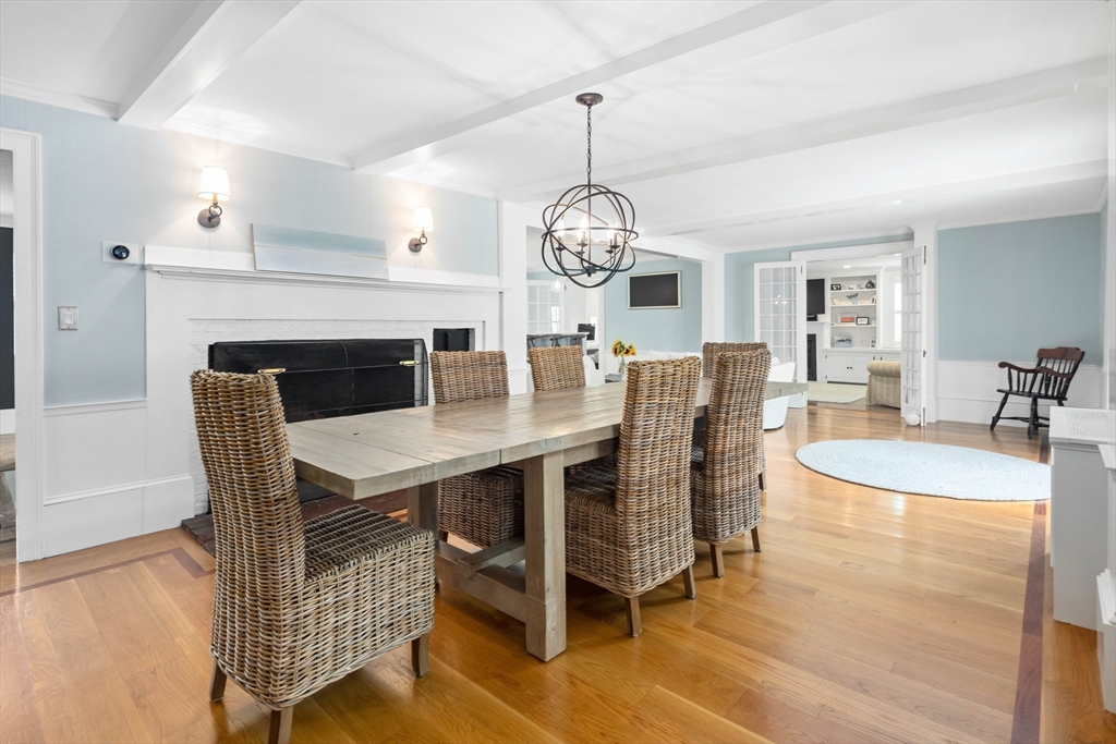 17 Common Street Scituate, MA 02066 - Photo 6 of 39 a view of a dining room with furniture wooden floor and chandelier