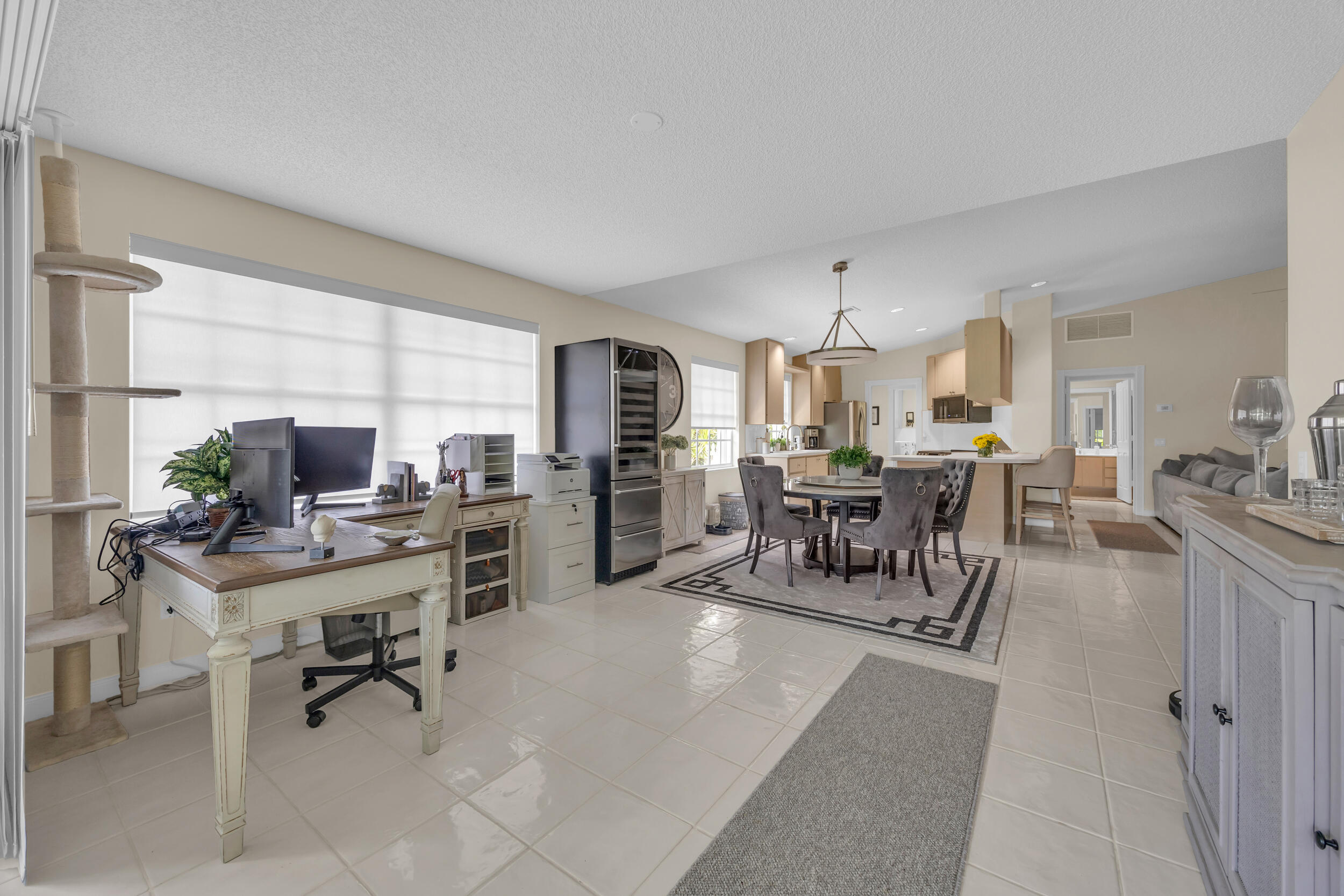 233 Brier Circle Jupiter, FL 33458 - Photo 14 of 31 a work room with furniture and a large window