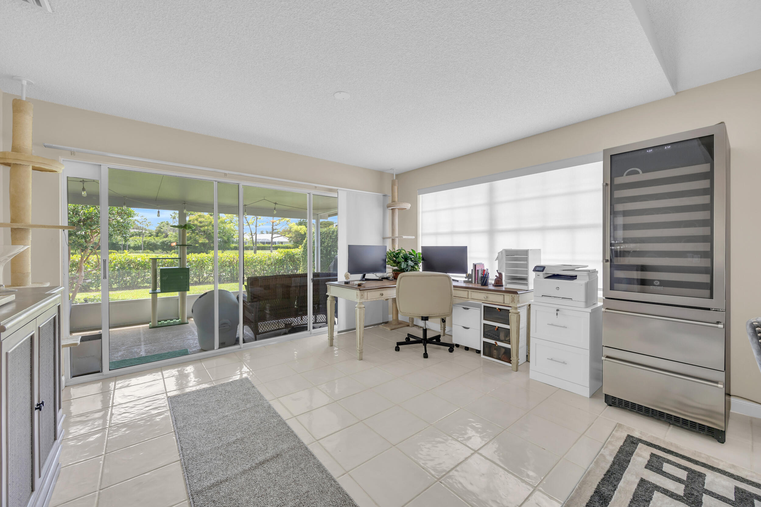 233 Brier Circle Jupiter, FL 33458 - Photo 15 of 31 a room with furniture a rug and a window