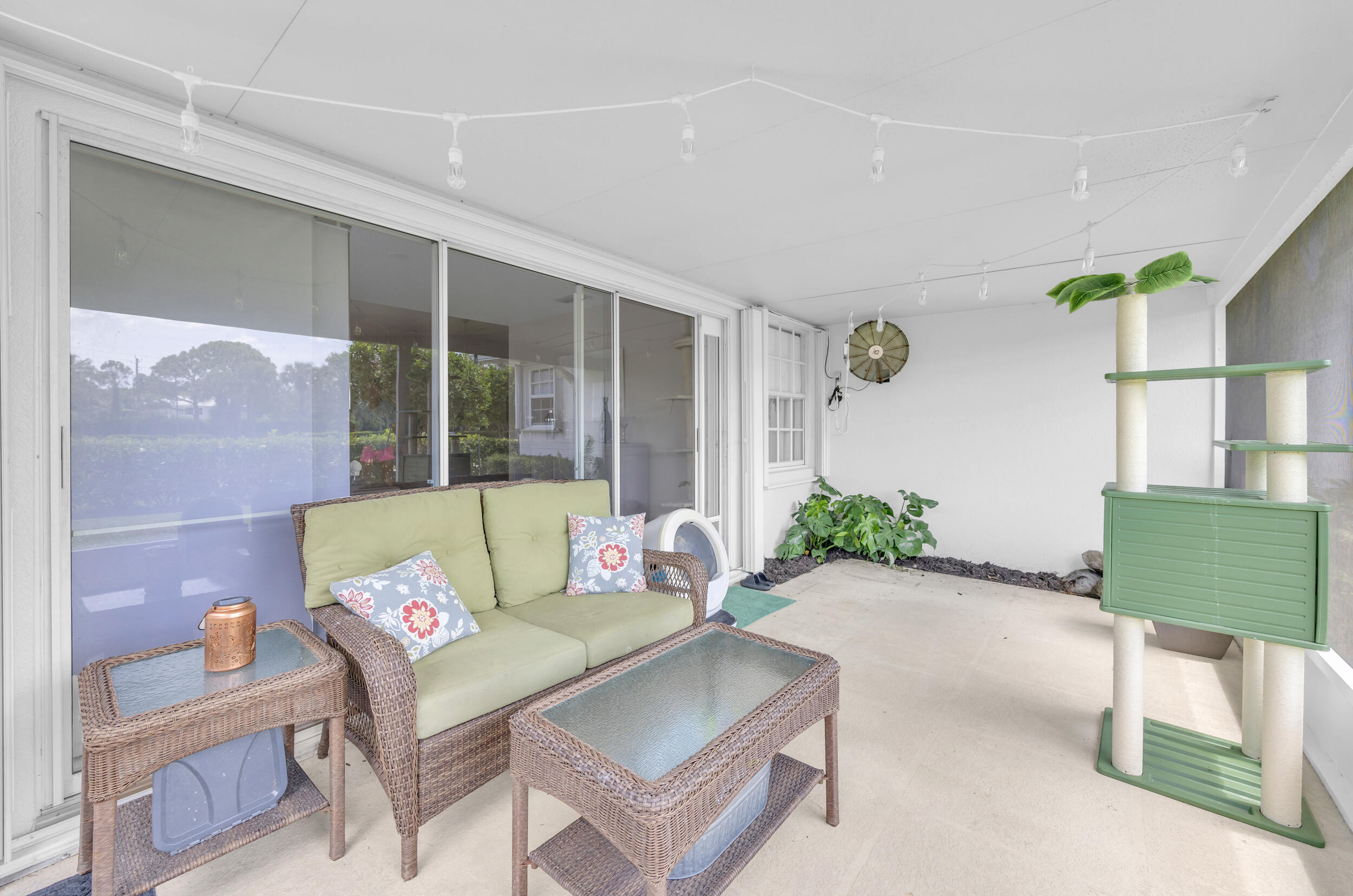 233 Brier Circle Jupiter, FL 33458 - Photo 26 of 31 a living room with furniture and a window