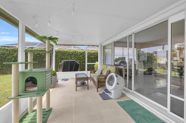 a living room filled with furniture and garden