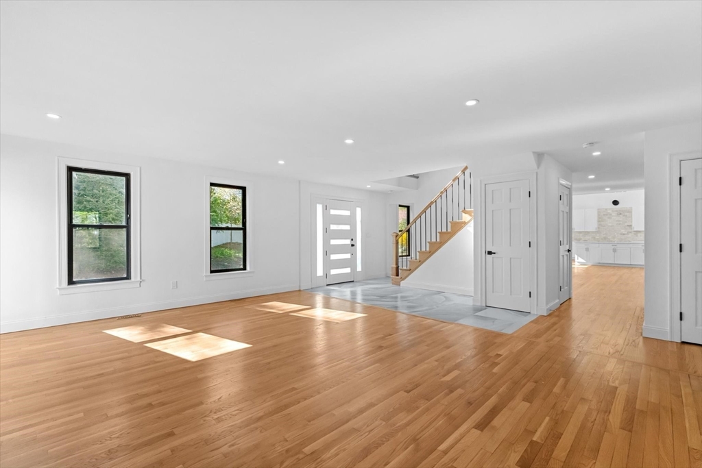 7 Garden Road Wellesley, MA 02481 - Photo 15 of 39 a view of empty room with wooden floor and window