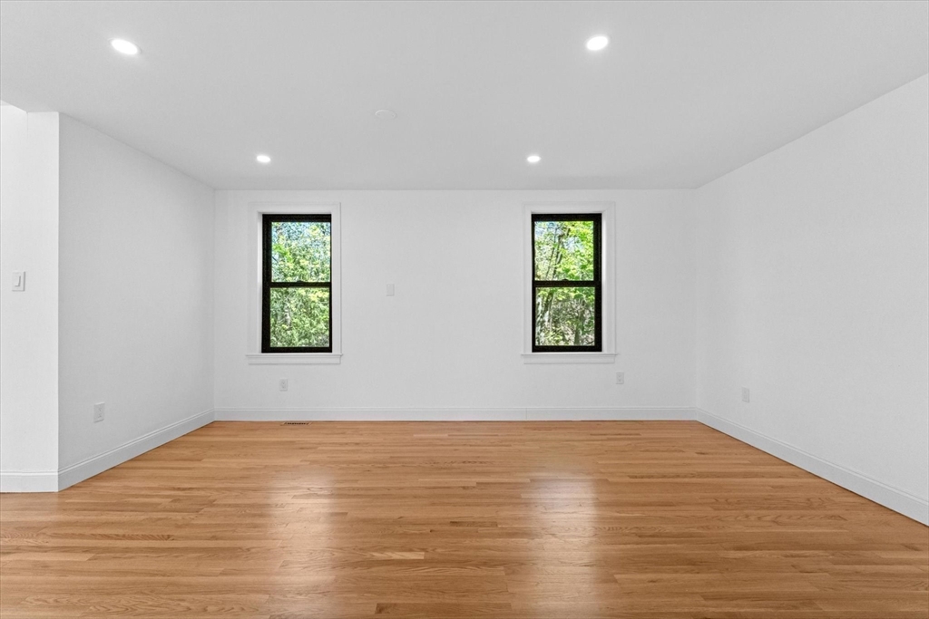 7 Garden Road Wellesley, MA 02481 - Photo 17 of 39 an empty room with windows