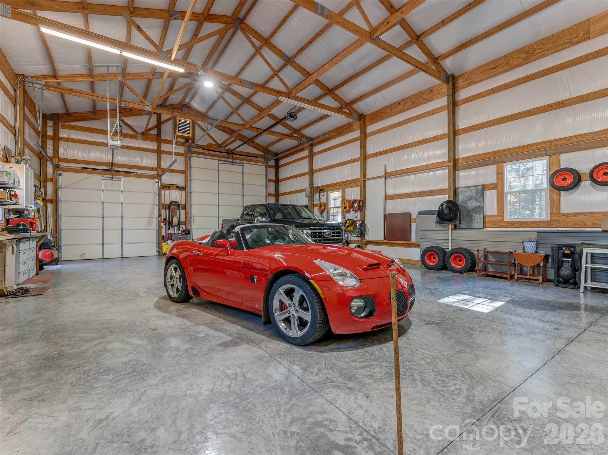1340 Macedonia Road Saluda, NC 28773 - Photo 42 of 45 a car parked in a garage