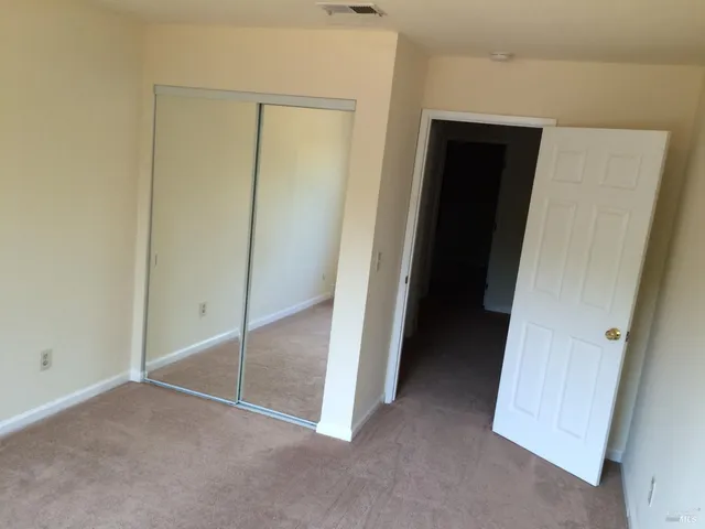 an empty room with closet