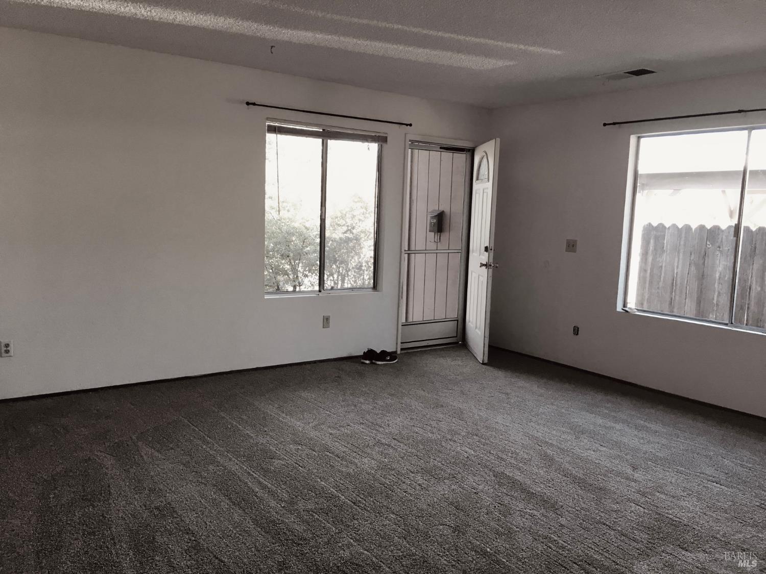 1222 Jacky Drive Santa Rosa, CA 95405 - Photo 5 of 21 a view of an empty room with a window