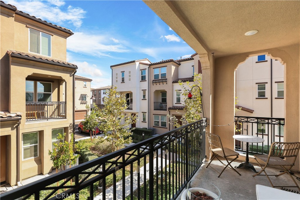 2317 West Broadway, Unit 96 Anaheim, CA 92804 - Photo 17 of 52 a view of a balcony with chairs