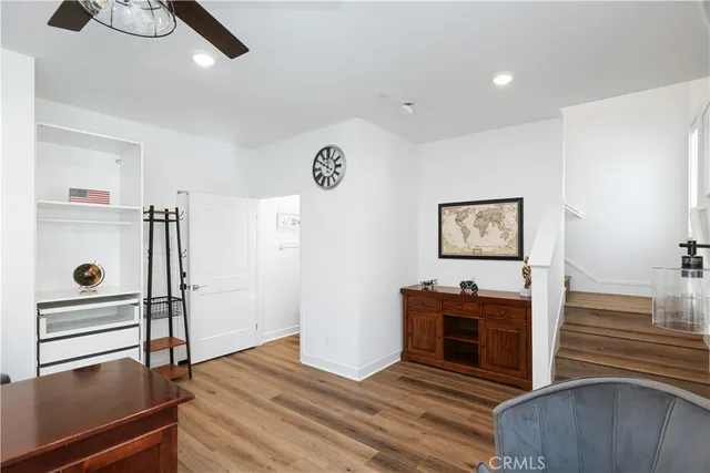 a view of a livingroom with wooden floor