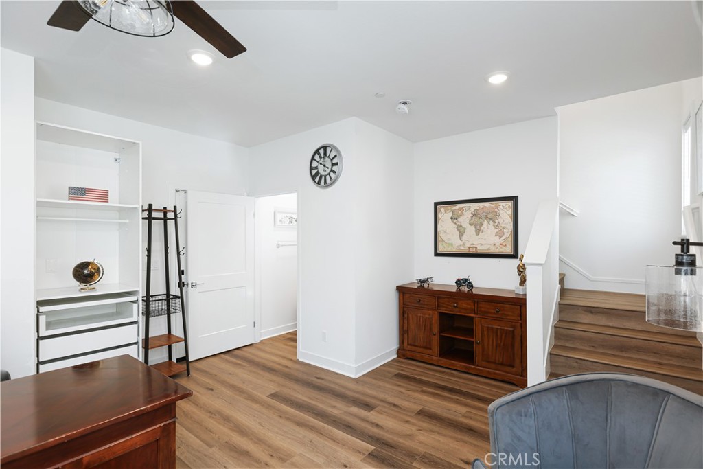 2317 West Broadway, Unit 96 Anaheim, CA 92804 - Photo 20 of 52 a view of a livingroom with wooden floor