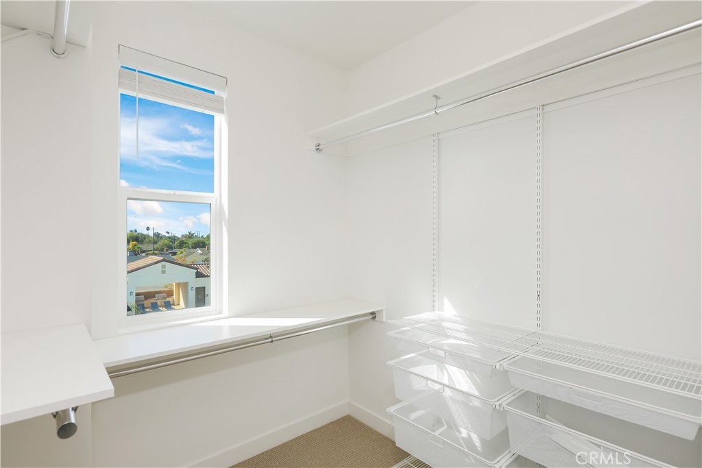2317 West Broadway, Unit 96 Anaheim, CA 92804 - Photo 29 of 52 a bathroom with a bathtub and a shower