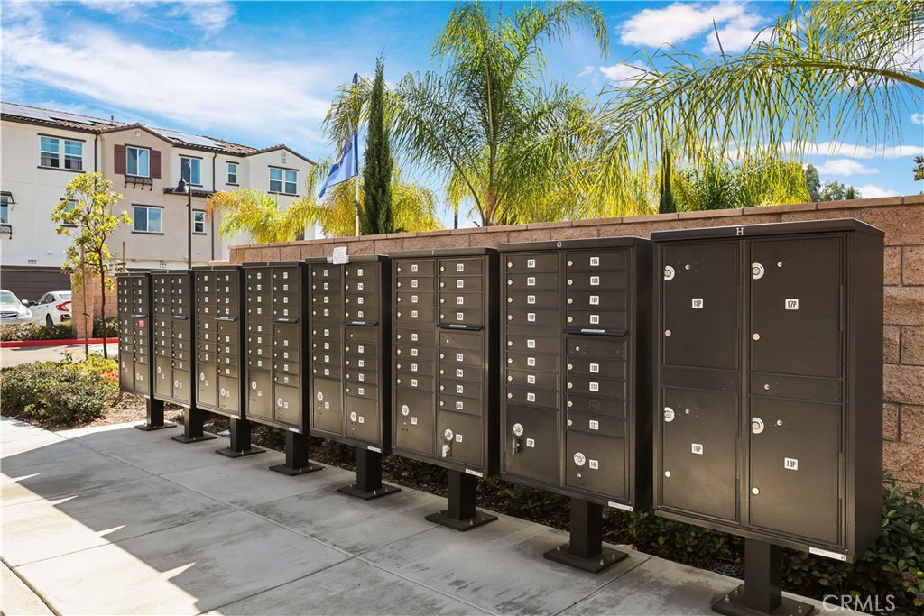 2317 West Broadway, Unit 96 Anaheim, CA 92804 - Photo 37 of 52 a view of a house with a yard